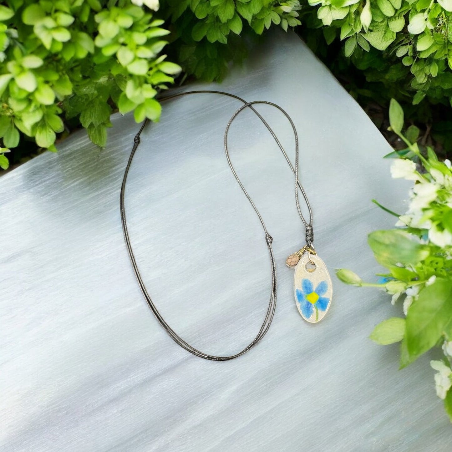 Hand painted blue flower with charm necklace